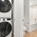 Stacked washer and dryer inside apartment homes at Edera Palm Springs